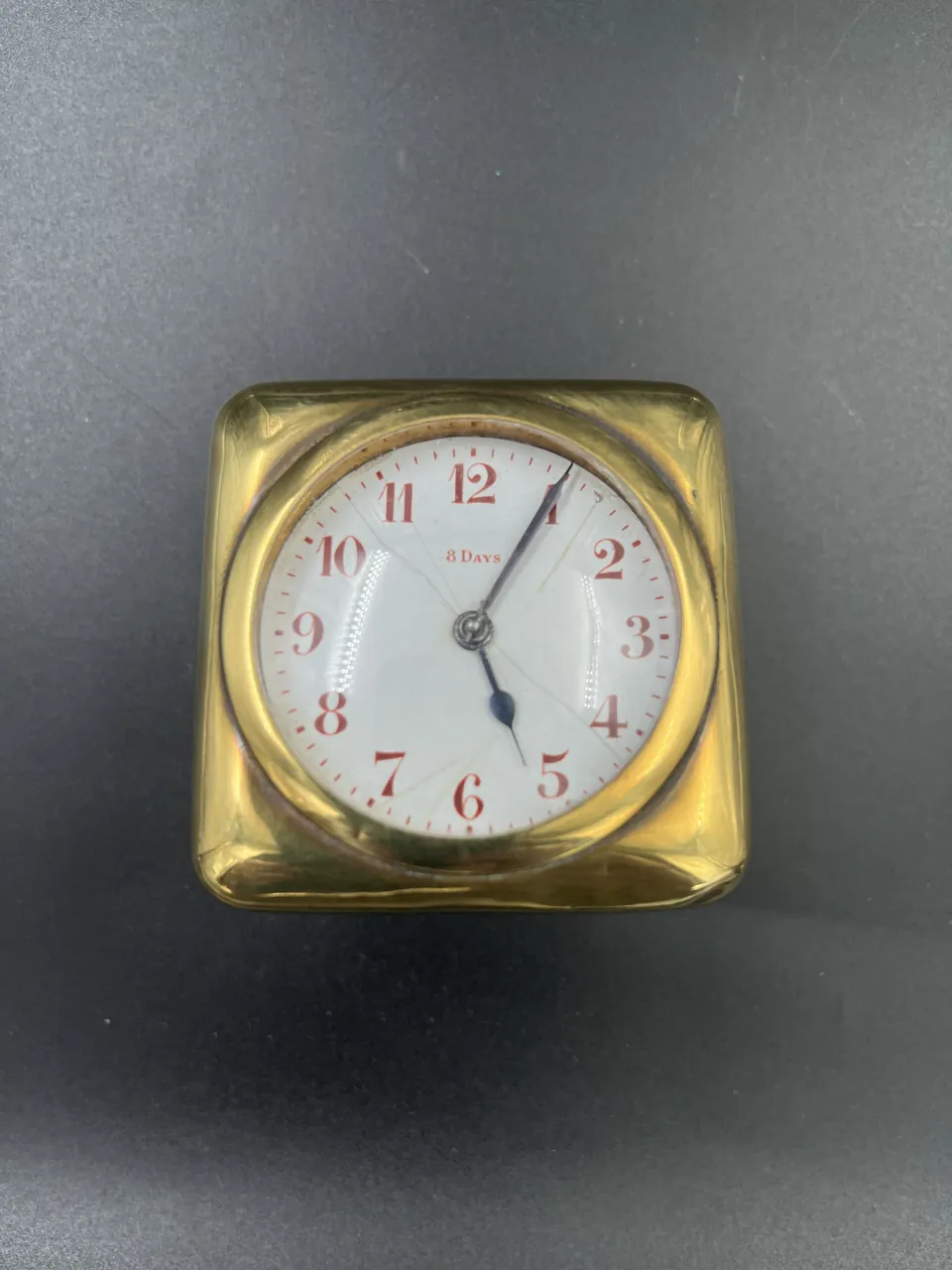 8-day clock in a mountable brass case